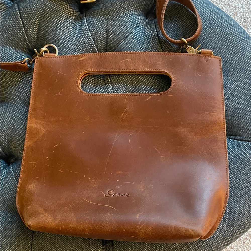 S-Zone quality crafted sturdy leather bag.